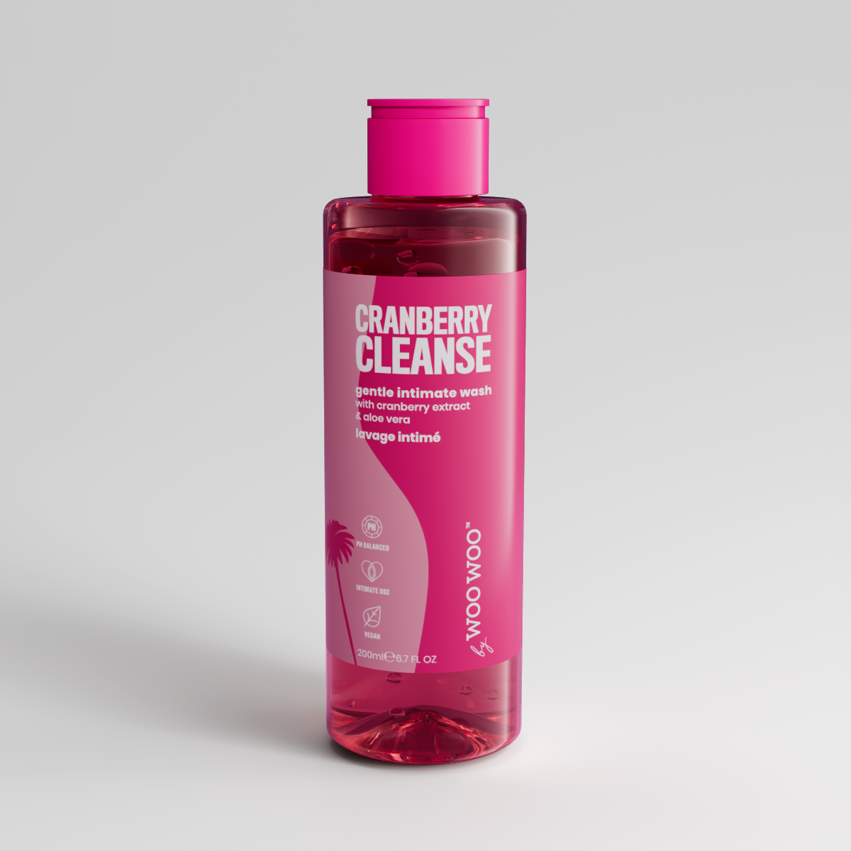 Pink bottle of Cranberry Cleanse on a light gray background