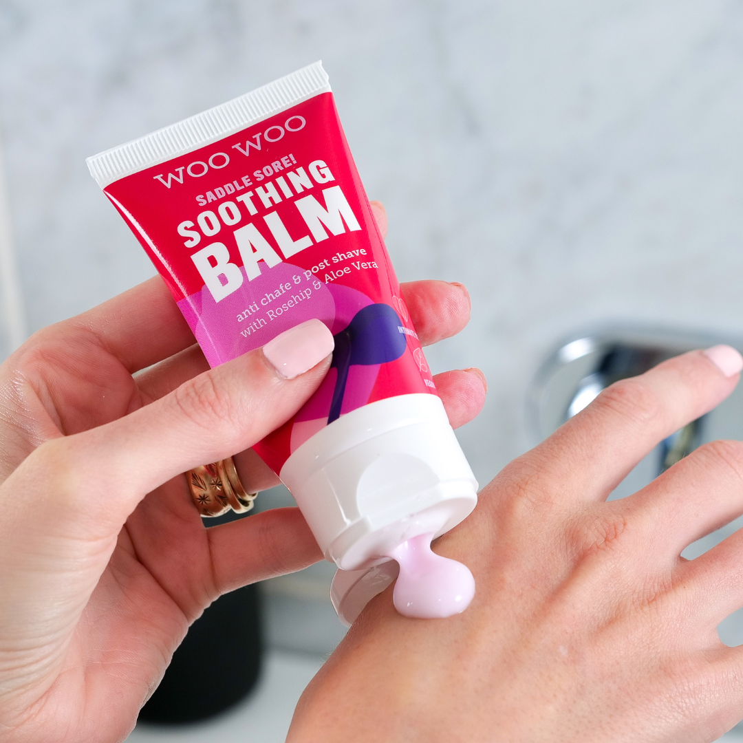 Tube of WooWoo soothing balm being used in the bathroom